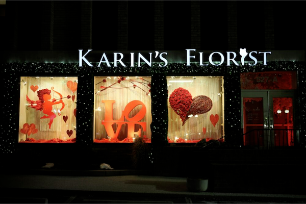 A window Valentine's display of Cupid and a heart.